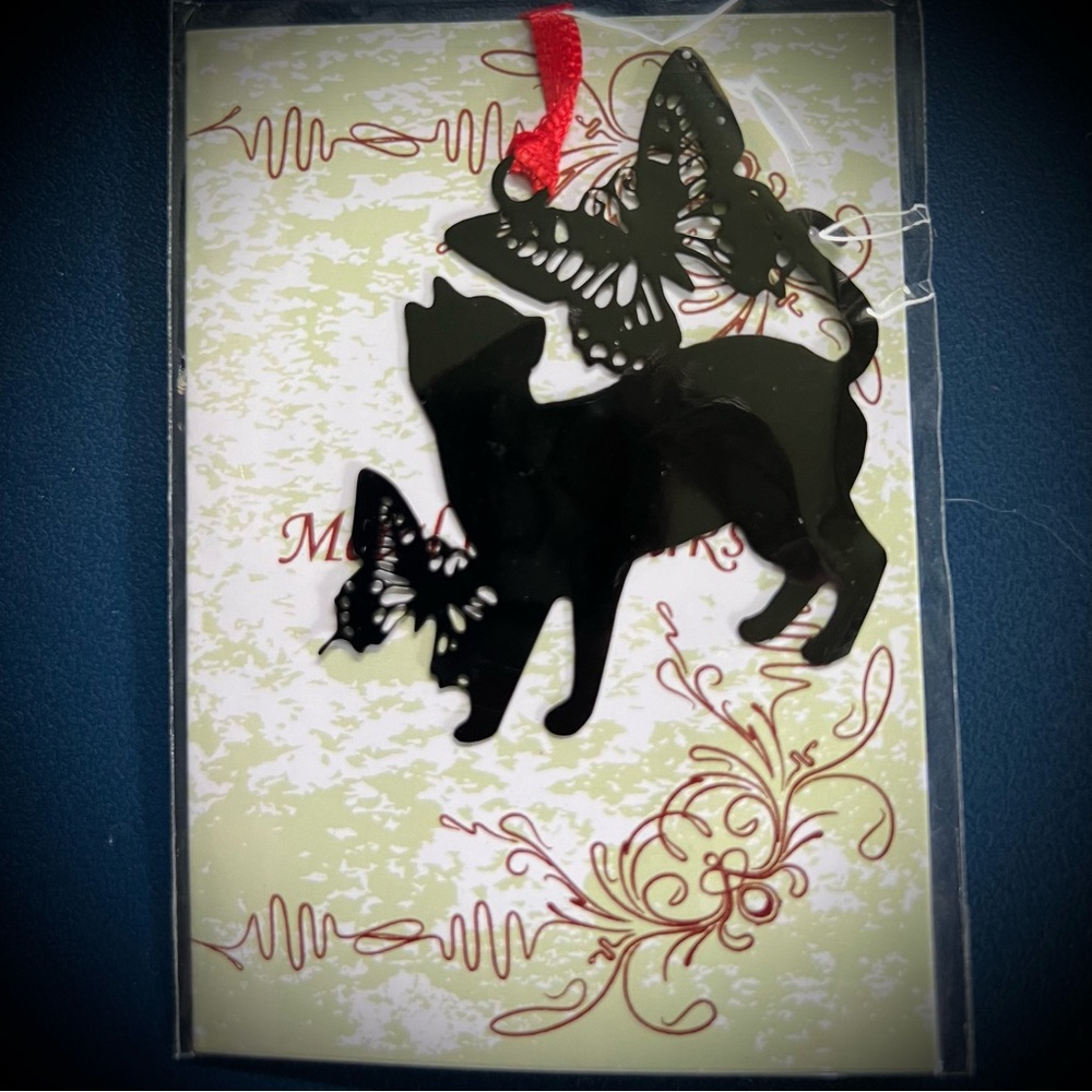 Black cat with butterflies metal ornament or bookmark with red ribbon